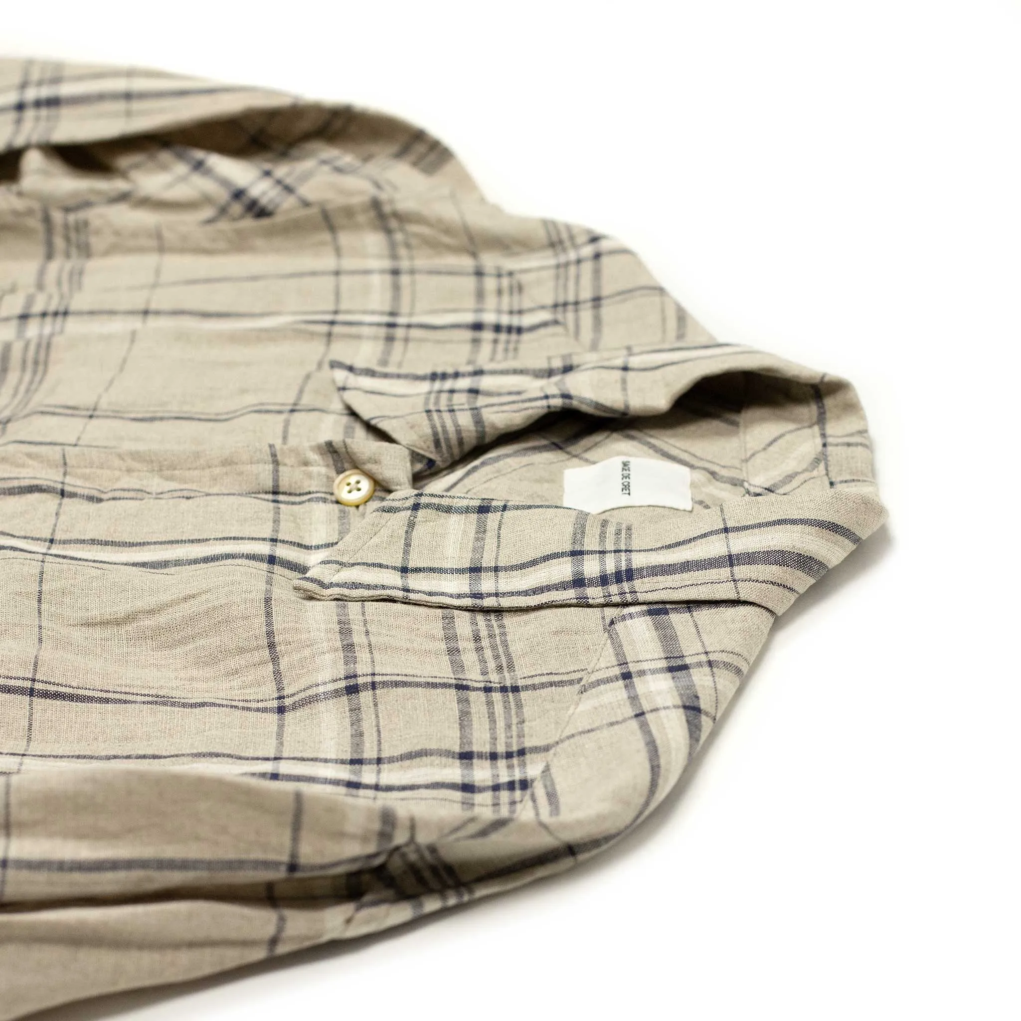 Open collar shirt in natural and navy checked linen