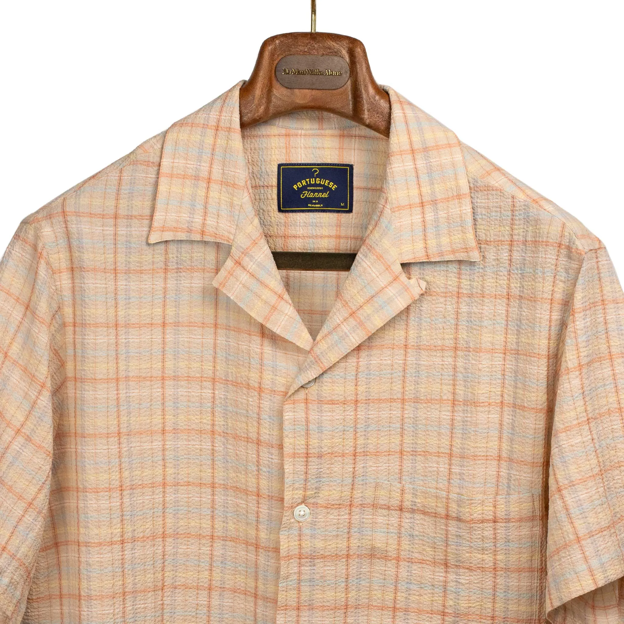 Plaid Crepe camp collar shirt in orange, beige, and blue plaid seersucker