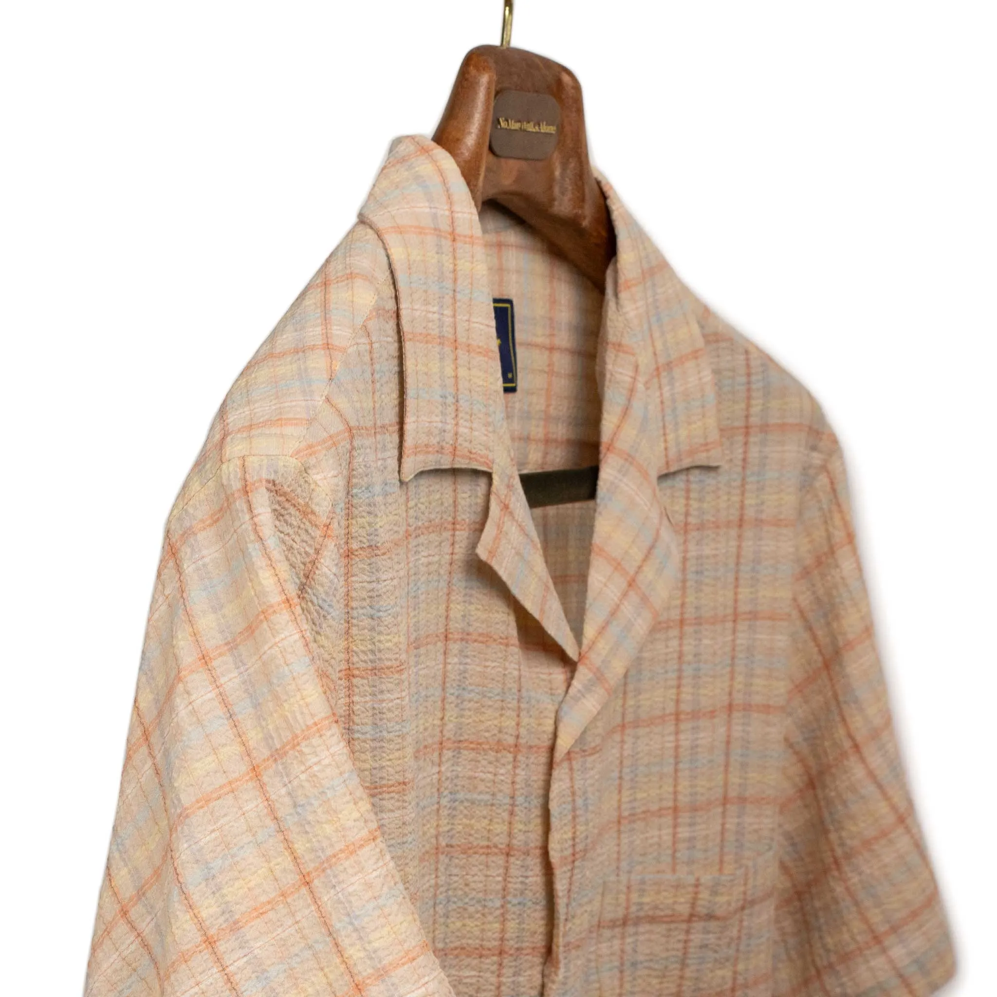 Plaid Crepe camp collar shirt in orange, beige, and blue plaid seersucker