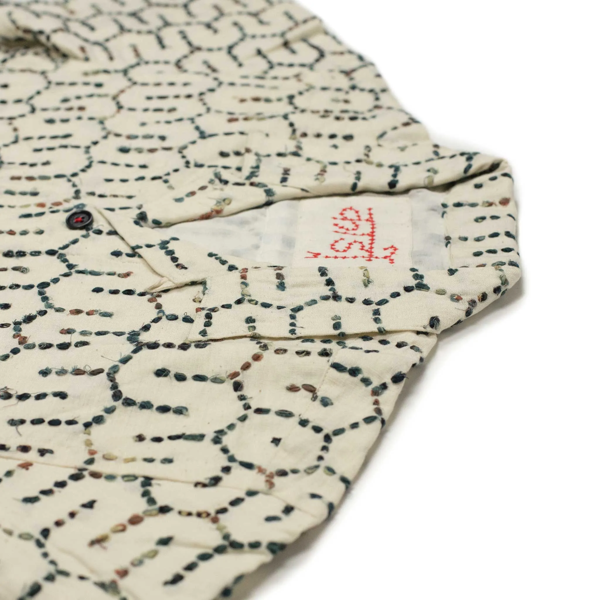 Ronen camp shirt in natural khadi cotton with honeycomb hand embroidery